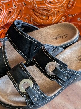Clarks Black Suede Slide Sandals with Silver Grommets